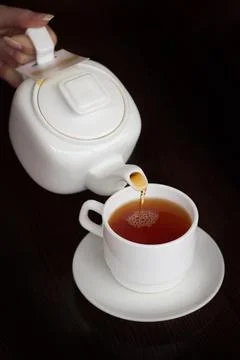 We give hot some tea Foto stock