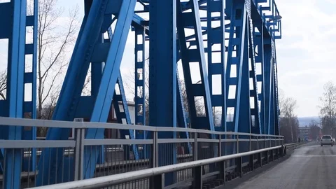 We go by car bridge across the river from one Bank to the other Stock Footage 111499711