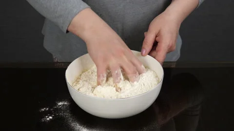 We knead and roll out the dough for pies. Video stock 172980245