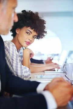 We know how to handle our business. Portrait of a young businesswoman working at Photos
