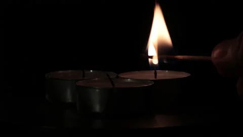 We light candles Stock Footage 221139843