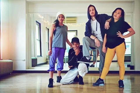 We live by the code of hip hop. a group of young friends hanging out in a dance Foto stock