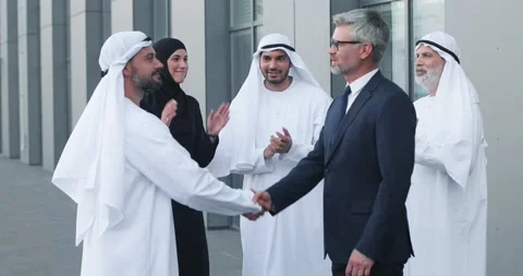 We made a deal. Full length view of successful two business partners shaking Stock Footage 161277137