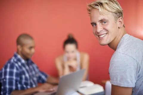We make an awesome study group. a group of university students studying together Stock Photos