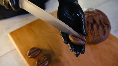 We make cookies in the form of coffee beans Stock Footage 194738026