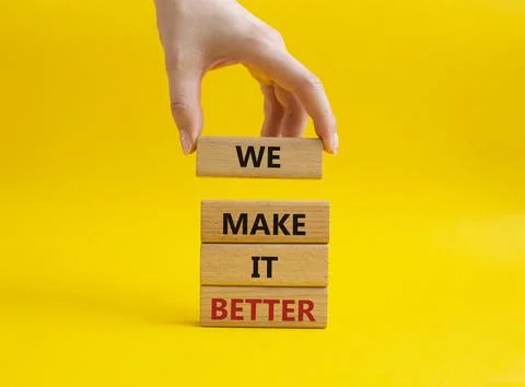 We make it better symbol. Wooden blocks with words We make it better. Beaut.. Stock Photos