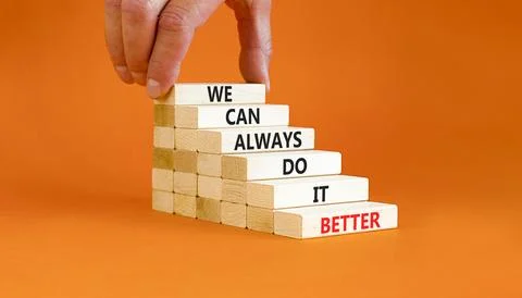 We make it better symbol. Concept words We can always do it better on woode.. Stock Photos