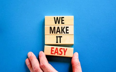 We make it easy symbol. Concept words We make it easy on wooden cubes. Beauti Stockfoto's