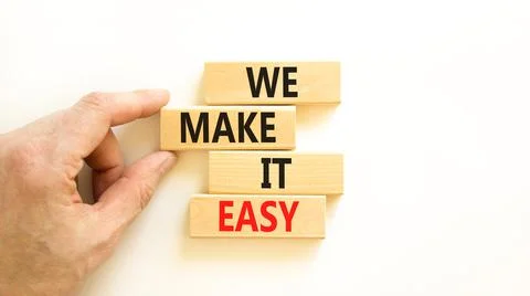 We make it easy symbol. Concept words We make it easy on wooden cubes. Beauti Stock Photos