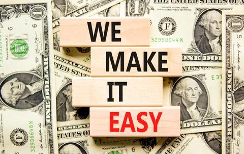 We make it easy symbol. Concept words We make it easy on wooden cubes. Beauti Stock Photos