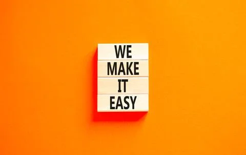 We make it easy symbol. Concept words We make it easy on wooden cubes. Beauti Stockfoto's