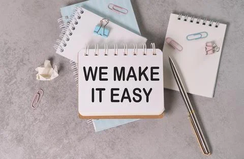 We make it easy text concept isolated over grey background, business concept. Stock Photos