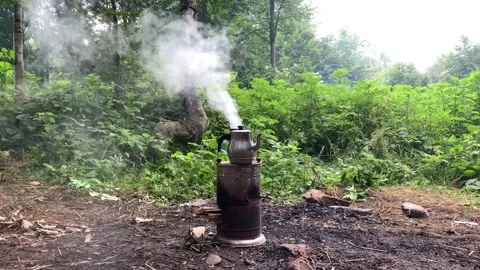 We make tea with a samovar while having a picnic Stock Footage 158026859