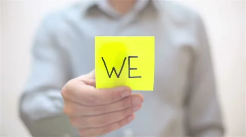 We. A man sticks a note on transparent screen Stock Footage 68088688