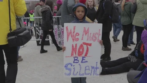 We Must Not Be Silent Protest Sign Little Boy - Womens March DC Stock Footage 81257614