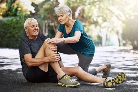 We need to get this checked out by a professional. a senior man suffering from Stock Photos