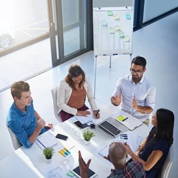 We need to keep track of our weekly progress. High angle shot of a group of Stock Photos