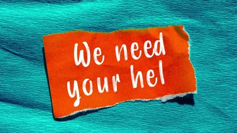 We need your help message writing on ripped torn paper background Stock Footage 332155284