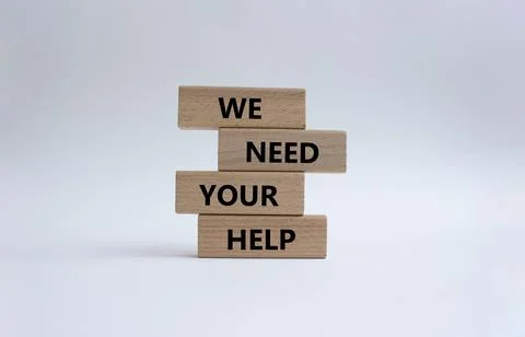 We need your help symbol. Wooden blocks with words We need your help. Beaut.. Stock Photos