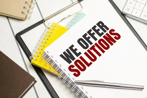 We offer solutions. Conceptual background with chart ,papers and pen Foto stock