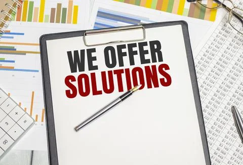 We offer solutions . Conceptual background with chart ,papers and pen Foto stock