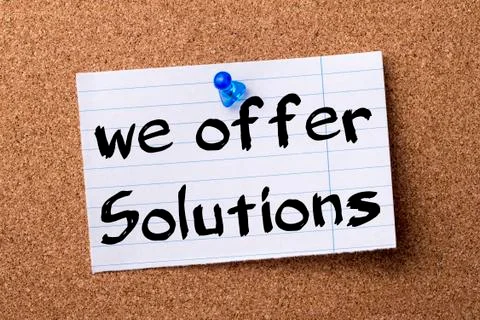 We offer Solutions - teared note paper  pinned on bulletin board Stock Photos