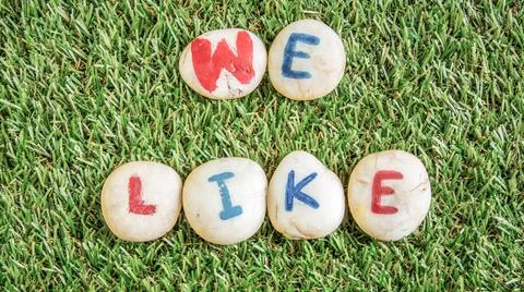 We like paint on stone , on the grass Stock Photos