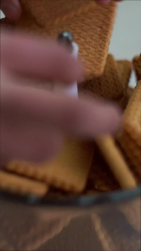 We put the cookies in a mixer to crush them. Stock Footage 320289477