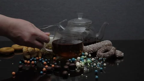 We put a cup of tea on the table Video stock 178422845
