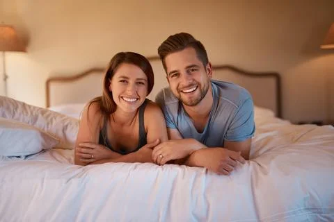 We share everything, even our bed. a loving young couple spending quality time Fotos Stock