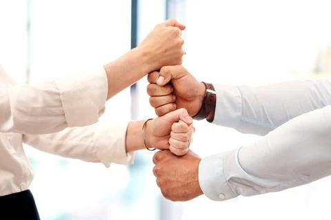 We stack up to some great things. Closeup shot of two unrecognisable Stock Photos