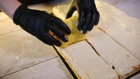 We twist the sponge roll with cream Stock Footage 194738366