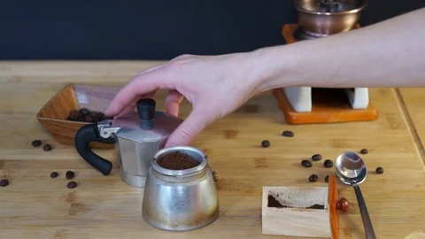 We twist the two halves of the moka coffee maker together Stock Footage 104748635