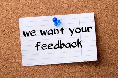 We want your Feedback! - teared note paper  pinned on bulletin board Stock Photos