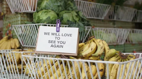 "We Will Love to See You Again" Sign at Local Grocery Store Entrance Video stock 345838387