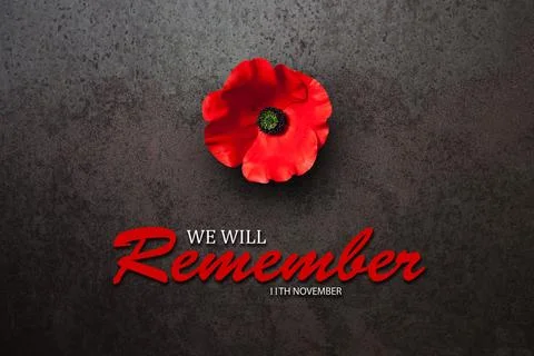 We Will Remember 11th November inscription with Poppy flower on rusty iron ba Stock Photos