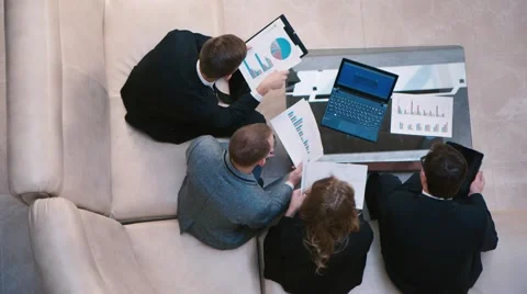 We work together - men and women work with the accounting data Stock Footage 56862512