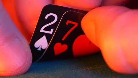 Weak hand, two of spades and seven of hearts in a game of texas hold em poker 스톡 동영상 263833695
