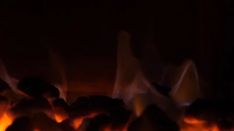 Weak lighted coals in oven at black ackground Stock Footage 98483968