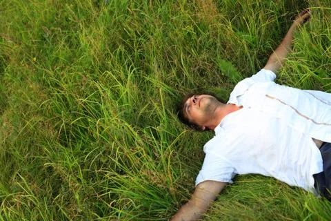Weakening in a grass Stock Photos