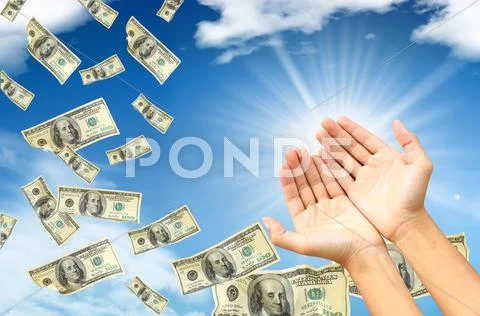 Wealth idea in a metaphor the hand holds some dollars. Stock Photos