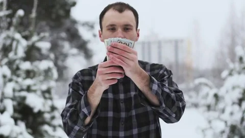 A wealthy guy counts money Stock Footage 84796264