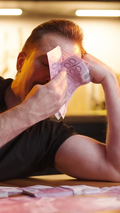 Wealthy man crying and wipe tears with stack of money banknotes meme sarcasm Stock Footage 324119180