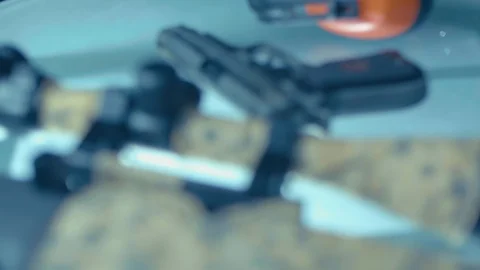Weapon on CSI expert table 動画素材 86413468