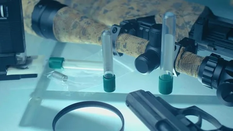 Weapon on CSI expert table Vídeo Stock 86413511