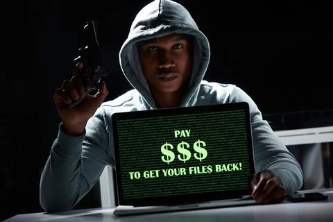 Weapon, hacking and portrait of man on laptop for online fraud, cybersecuri.. Stock Photos