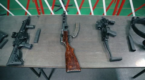 Weapon lie on the table in the dash Stock Footage 60188943