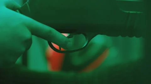 Weapon shot . Close-up finger pulls the ... | Stock Video | Pond5