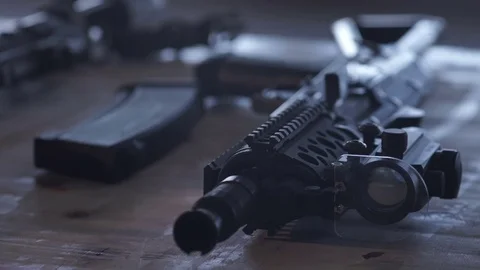 The weapon is on the table Видео 75327296