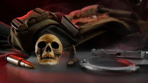 Weapons and armor of agent with handcuffs Stock Footage 124770721